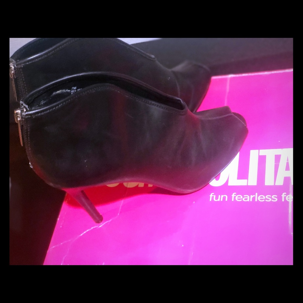 Cosmopolitan black and brown ankle boots...